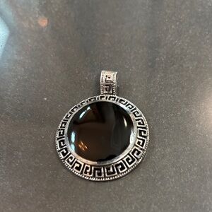 Vintage sterling silver Onyx pendant stamped on back